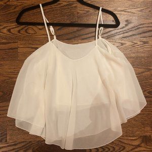 White flowy tank top with thin spaghetti straps